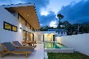 villa amour exterior at night.webp